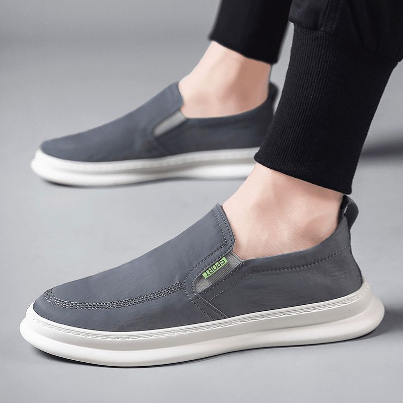 Män Ice Silk Cloth Andningsbara Körskor Slip On Skate Sneakers